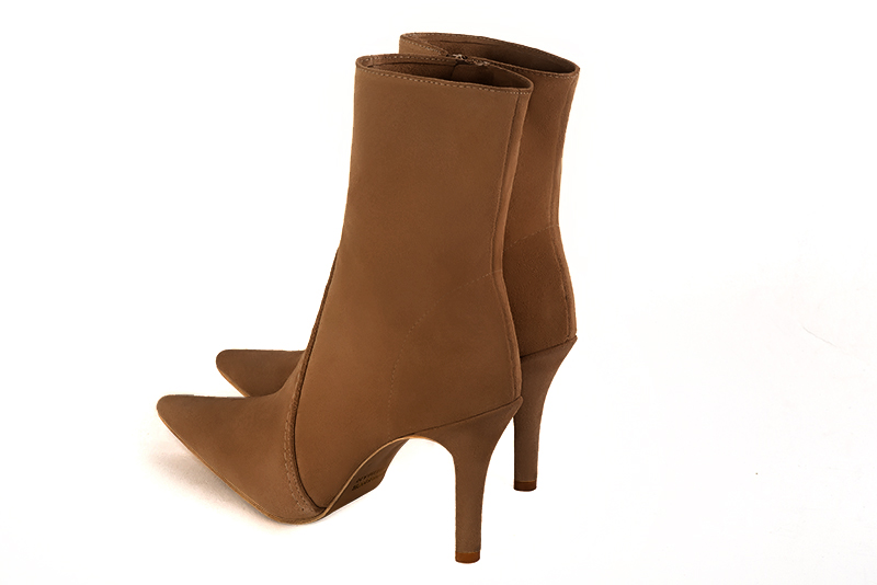 Caramel brown women's ankle boots with a zip on the inside. Pointed toe. High slim heel. Rear view - Florence KOOIJMAN